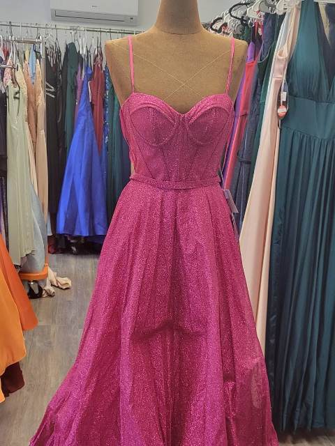 Robe de bal fuchsia corset, tulle pailleté